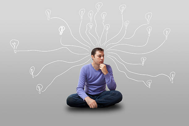 istock Man searching for ideas outside of the box 519223462