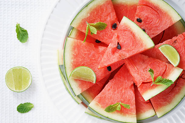 istock Watermelon. Slices of fresh watermelon on white 519228170