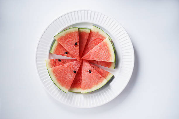istock Watermelon. Slices of fresh watermelon on white 519229114