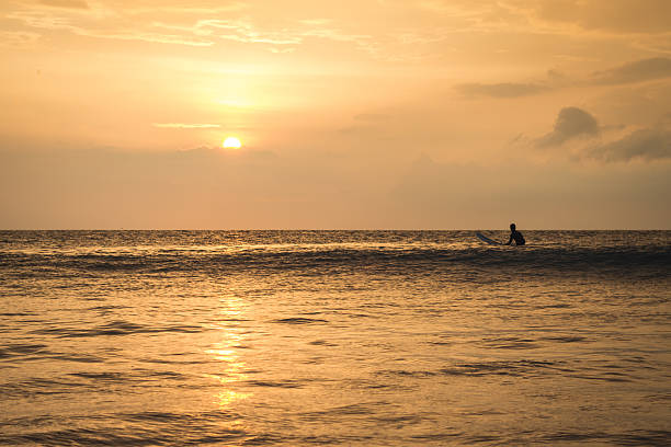 istock Surfer waits for waves in the lineup 519247419