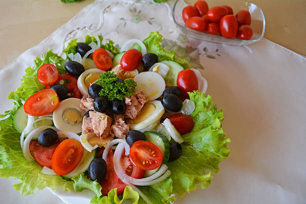 istock Mixed vegetable salad with tuna and olive oil 519250087