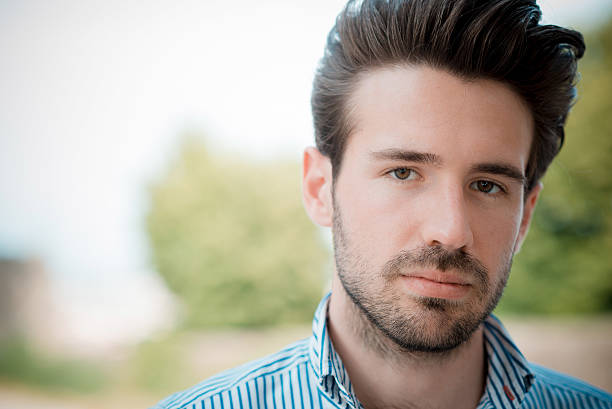 istock young handsome hipster modern man outdoor 519250255
