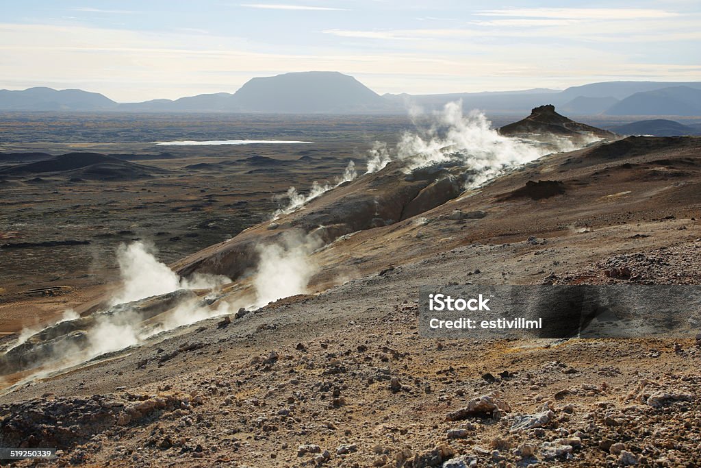 Landscape in the geothermal area Hverir Landscape in the geothermal area Hverir, Iceland. Agricultural Field Stock Photo