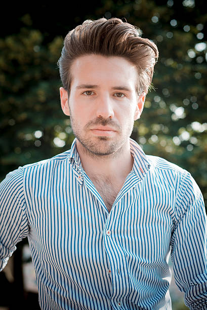 istock young handsome hipster modern man outdoor 519251329