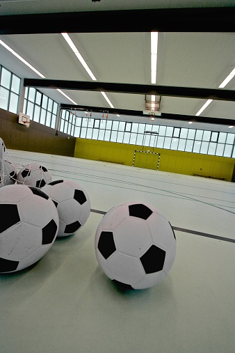 Football's to soccer in a sports hall
