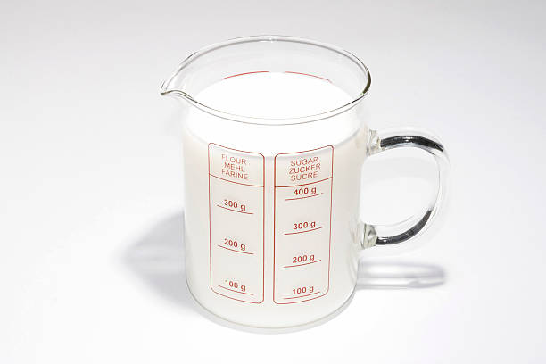 istock glass of milk on white background 519253723