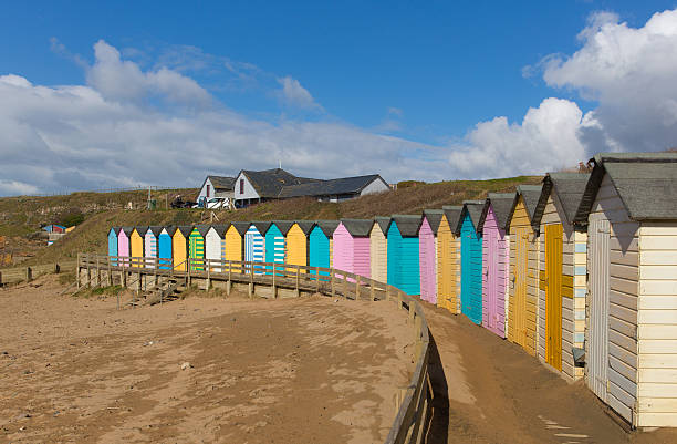 istock Bude North Cornwall England uk with colourful pastel beach huts 519262152