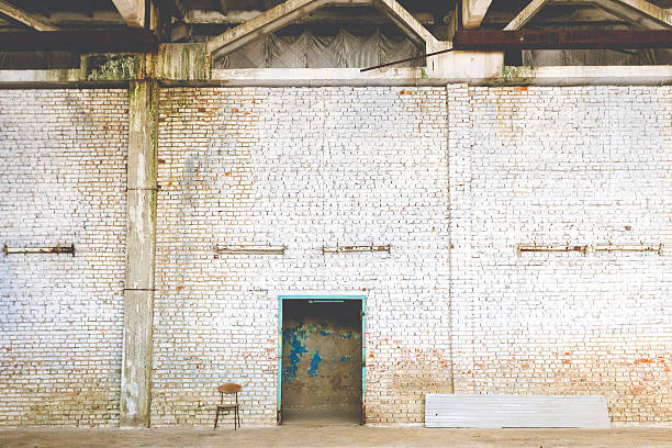 istock brick wall in an abandoned factory as textures 519263876