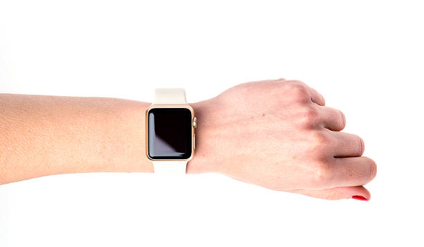 İstanbul, Turkey - April 2, 2016:  Apple Watch on hand isolated on a white background. Apple Watch is a smart watch, developed by Apple Inc.