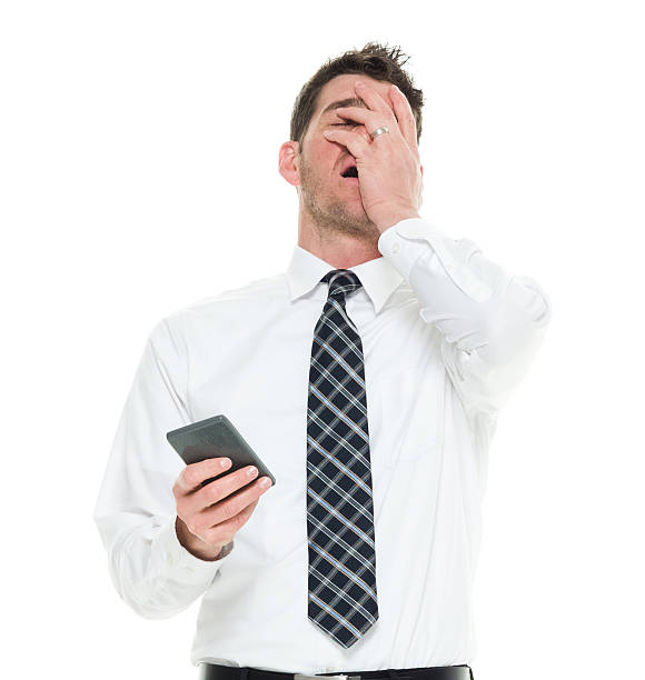 istock Upset businessman holding phone 519268398