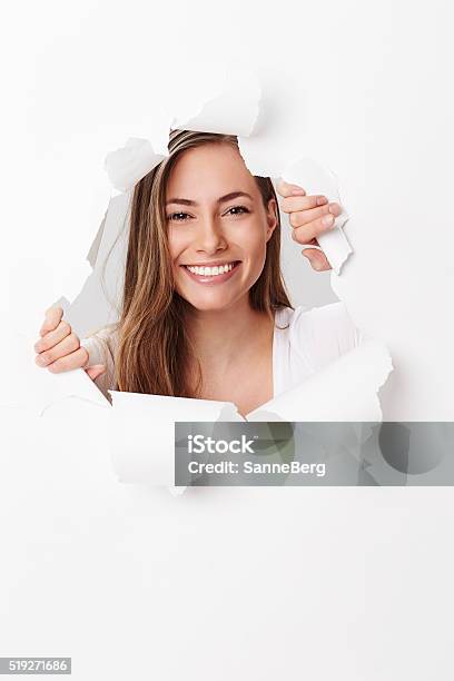 Young Woman Smiling Through Tears In Paper Portrait Stock Photo - Download Image Now