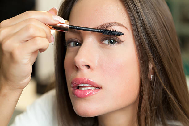 istock Woman wearing make up 519271688