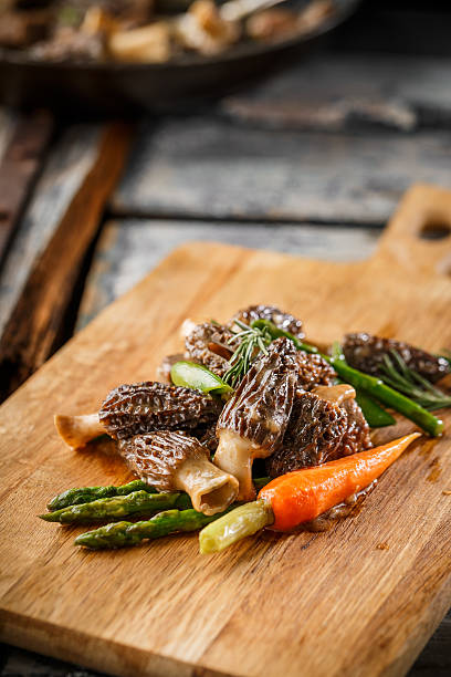 istock Morel Mushrooms on the cutting board 519271728