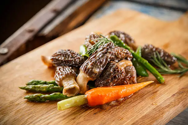 Morel Mushrooms on the cutting board