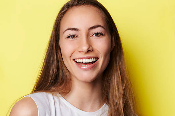 istock Beautiful and smiling young woman in studio 519272010
