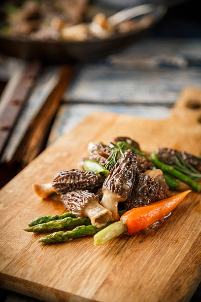 istock Morel Mushrooms on the cutting board 519272200