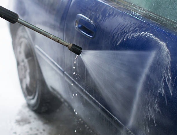 istock Car wash using high pressure water jet. 519272820