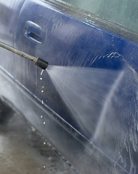 istock Car wash using high pressure water jet. 519272844