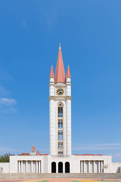istock Gothic style clock tower, Assumption University, Thailand. 519272950