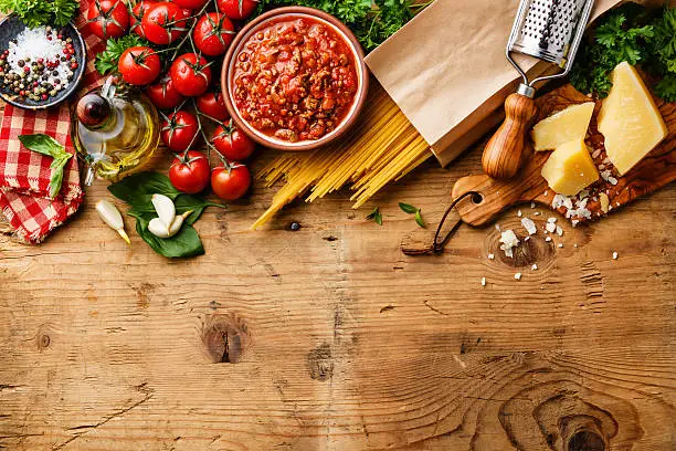 Italian food background with Spaghetti Bolognese ingredients