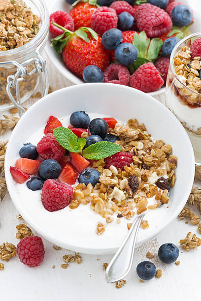 istock healthy breakfast with natural yogurt, muesli and fresh berries 519274510