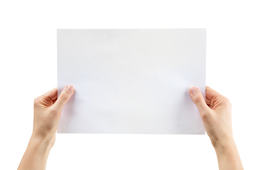 Hands holding paper, isolated on a white background, clipping path