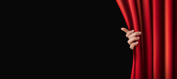 istock Background with red velvet curtain and a wooden floor. 519279235