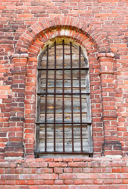 istock Window in an old brick church 519280175