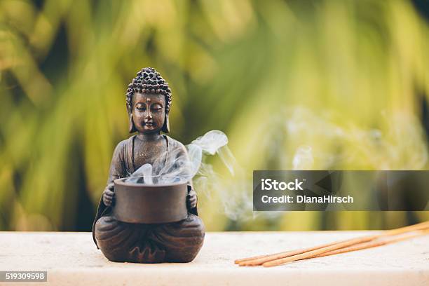 Buddha Figurine With Incense Stock Photo - Download Image Now - Buddha, India, Incense