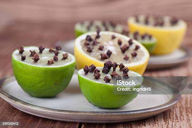 Lemon And Limes With Cloves Natural Insect Repellent Stock Photo - Download Image Now