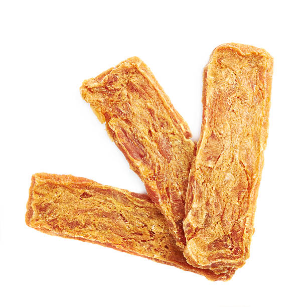 istock Dried meat strip snack isolated 519311046