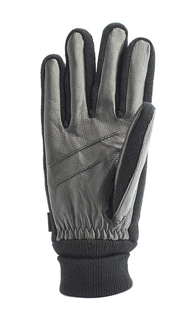 istock Black leather winter glove isolated 519311516