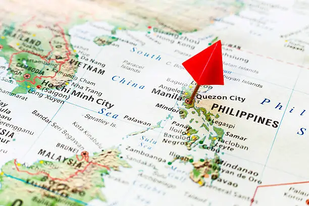 Photo of World map with pin on city of Philippines, Manila.