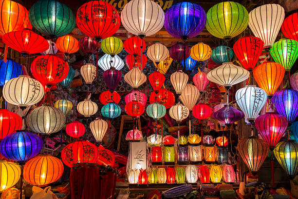 Colorful traditional lanterns A colorful lantern shop in Old Town of Hoi An, Vietnam.  vietnamese culture photos stock pictures, royalty-free photos & images