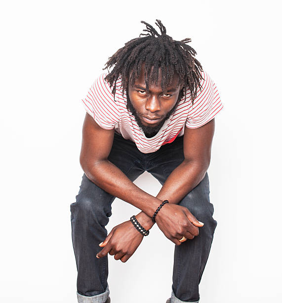 istock young handsome afro american man, angry look, weed junky isolated 519314132