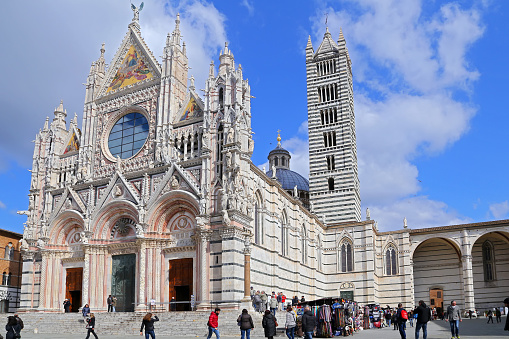 Siena, Italy - March 12, 2016: external facade of the cathedral of Siena