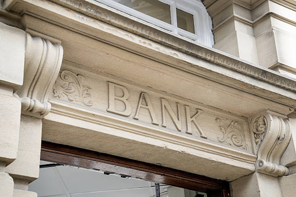 istock Bank Sign logo entrance, Stone Background 519325517