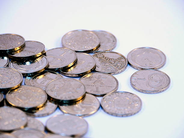 istock Bunch of Latvian lat coins on white background 519326119