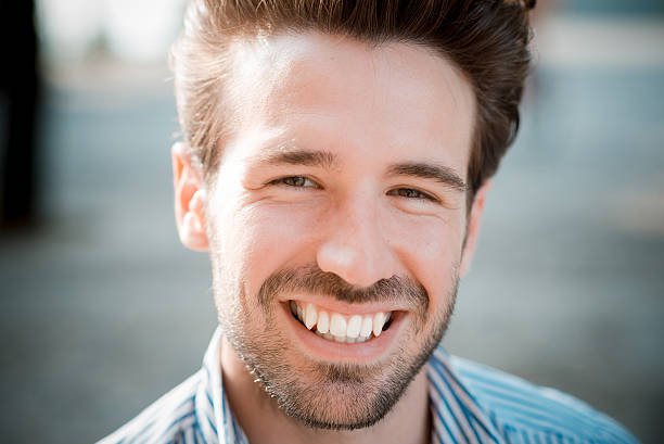 istock young handsome hipster modern man outdoor 519326121