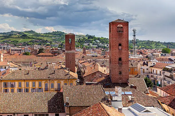 Red roofs and medieval towers in Old City of Alba, Italy (view from above).