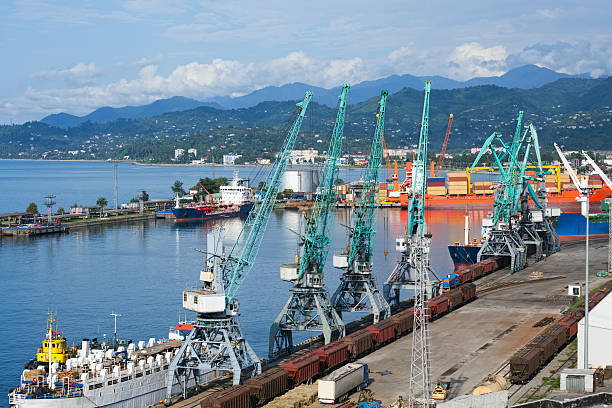 istock Ships, wagons and cranes in seaport 519329427