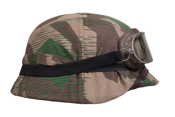 istock camouflaged nazi german helmet with protective goggles 519330141