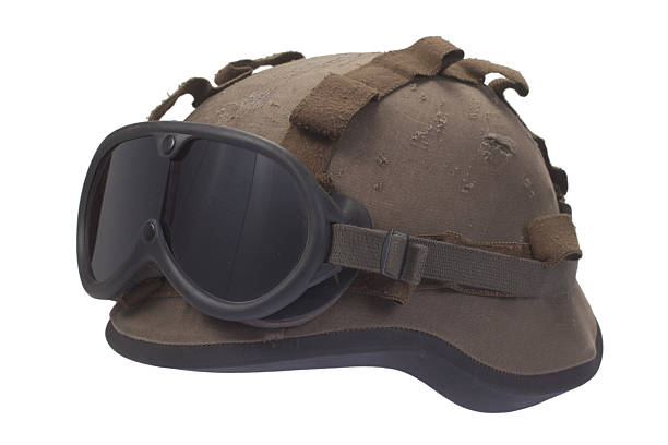 istock kevlar helmet with camouflage cover and protective goggles 519330161
