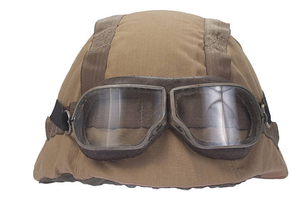 istock kevlar helmet with camouflage cover and protective goggles 519330179