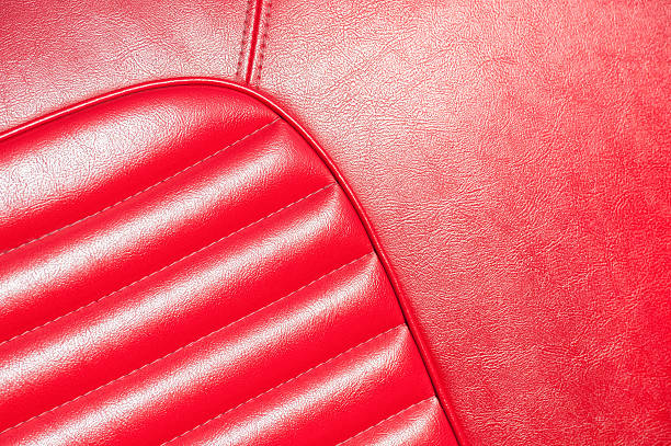 primo piano in pelle rossa - car leather hide seat foto e immagini stock