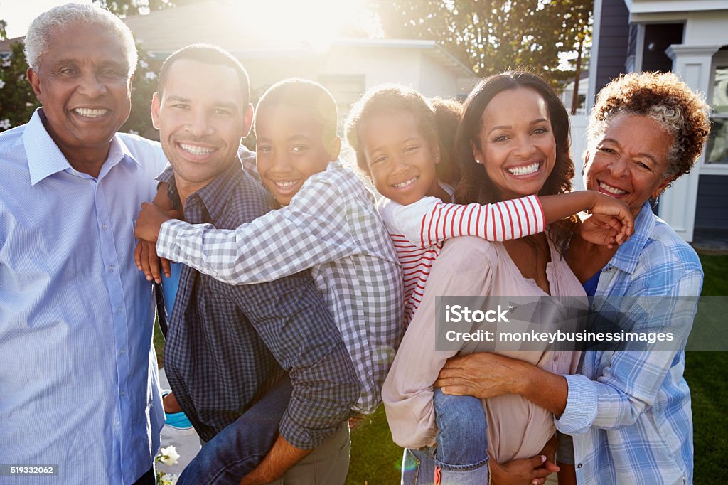Black multi generation family outside, backlit portrait African Ethnicity Stock Photo