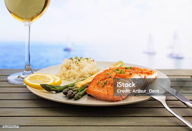 Salmon With Asparagus And Rice Stock Photo - Download Image Now - Beach, Plate, Fish