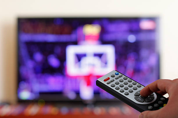 istock Televesion remote control in the hand, zapping 519333306