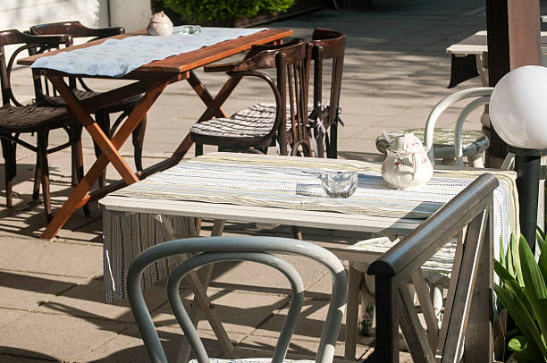 istock Tables and chairs of street cafe 519338564