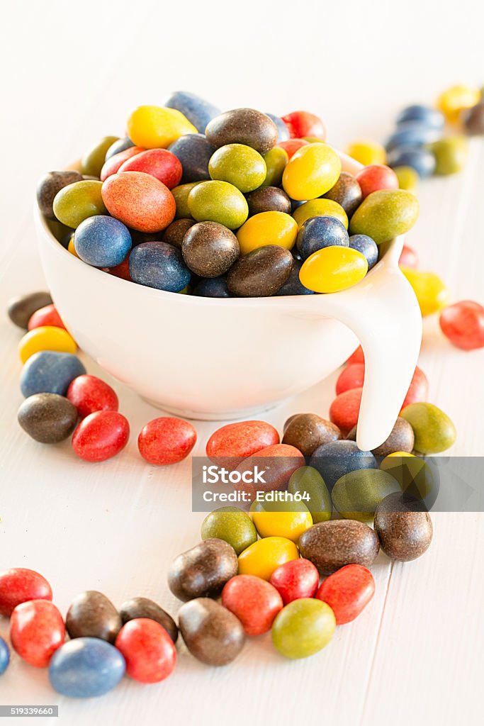 Chocolate Dragees Colorful chocolate dragées filled with peanuts. Candy Stock Photo